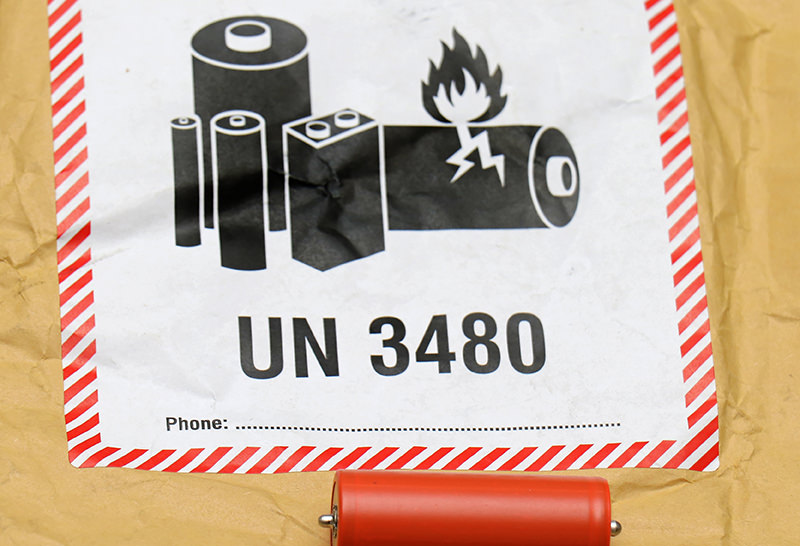 Packaging with lithium-ion battery warning label