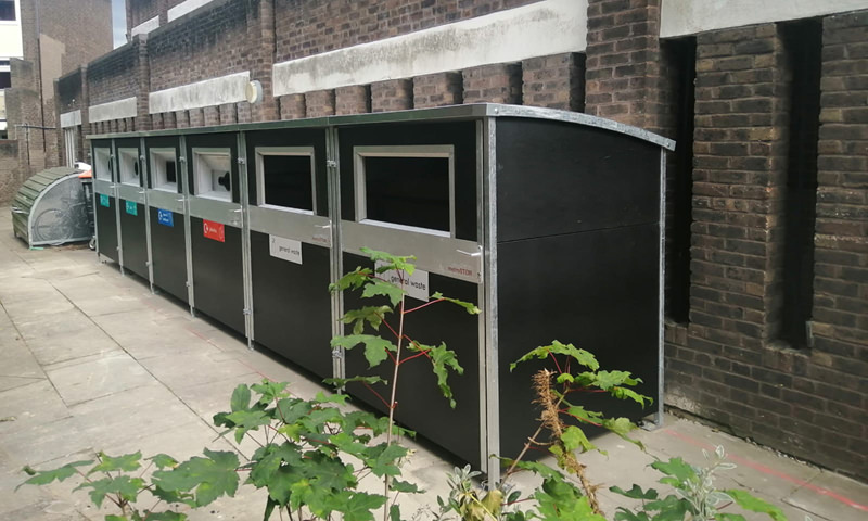 Waste and recycling bin housings