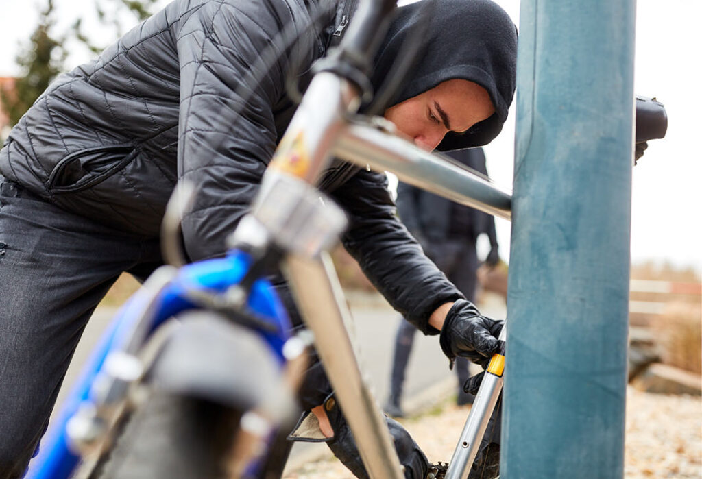 Thief stealing a bike