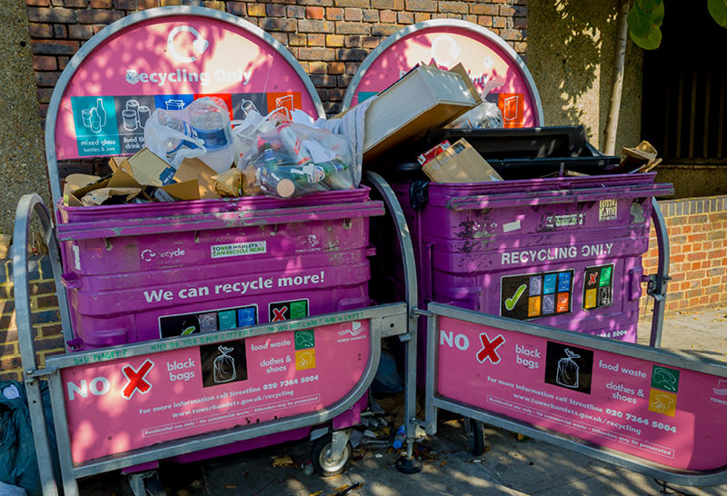 Recycling bins with signage